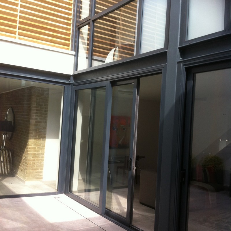 Anthracite aluminium sliding patio doors fitted in Stanmore